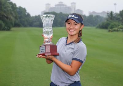 Zhang savors maiden pro golf win in Hainan