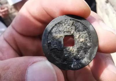 Ming Dynasty copper coin unearthed at Great Wall for first time