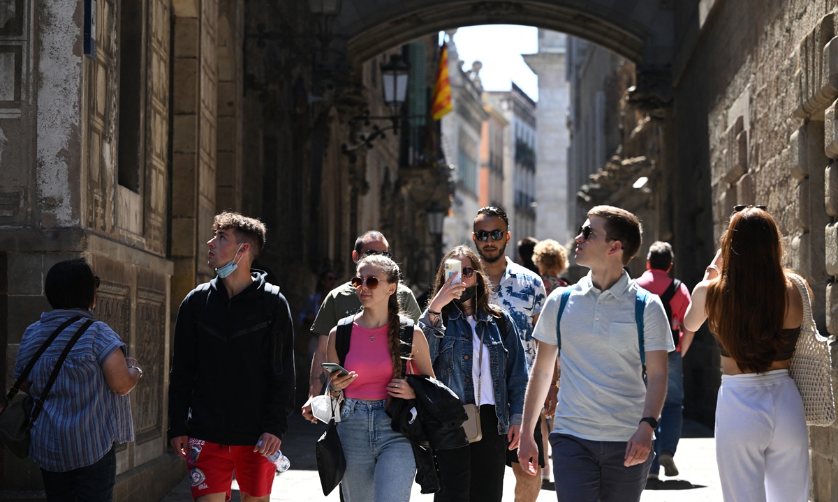 Mass tourism returns to Barcelona – so does debate