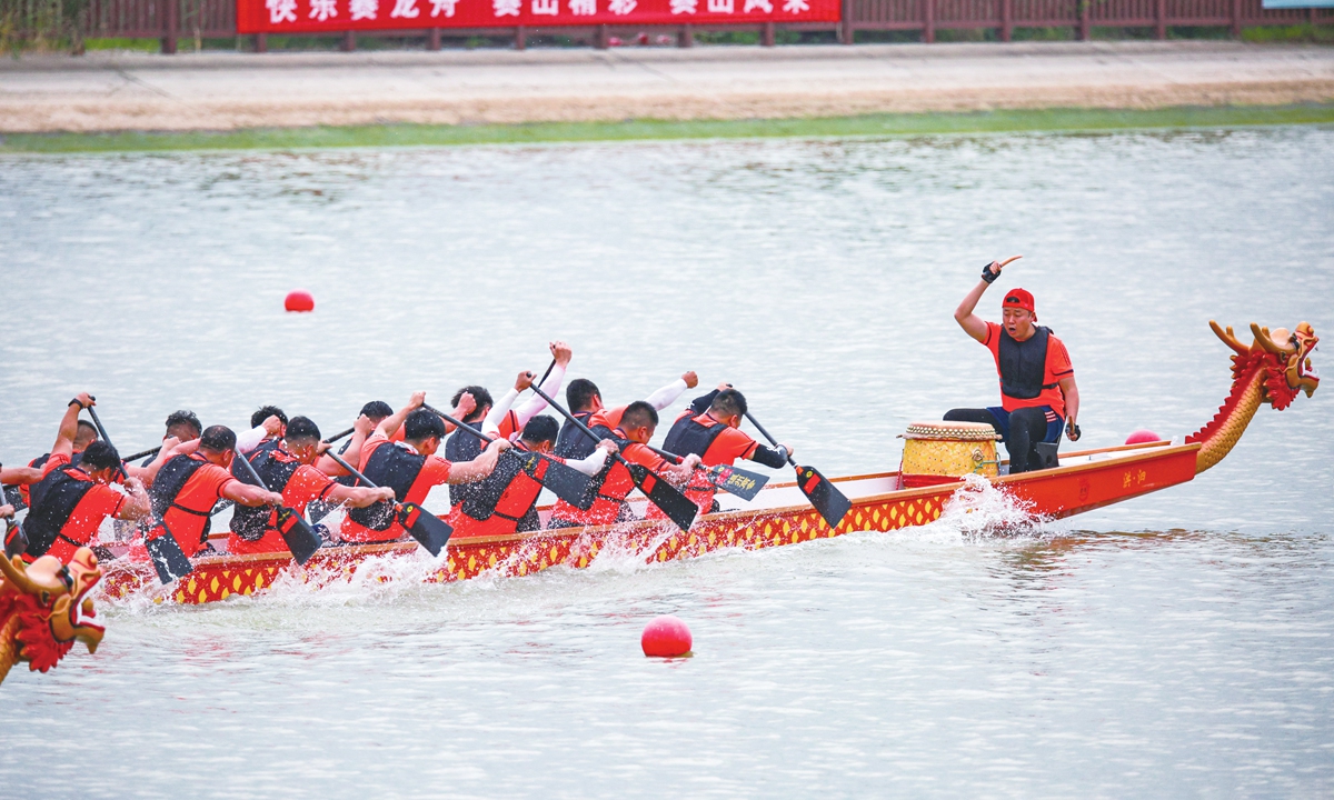 Ancient dragon boat festival thrives by underlining teamwork, unity