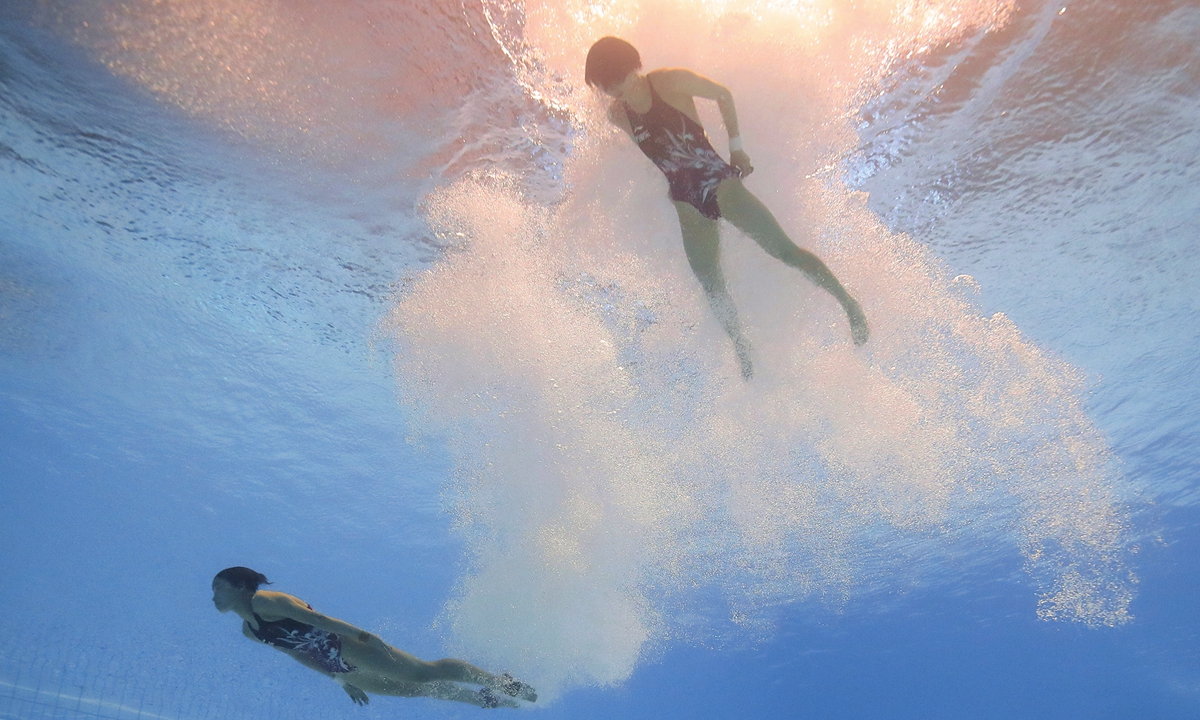 Chen, Quan win gold at world aquatics championship