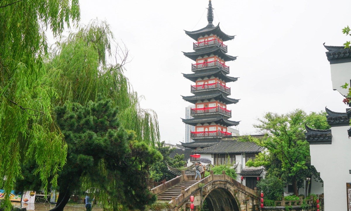 Exhibition highlighting 800-year-old Fahua Tower kicks off in Shanghai