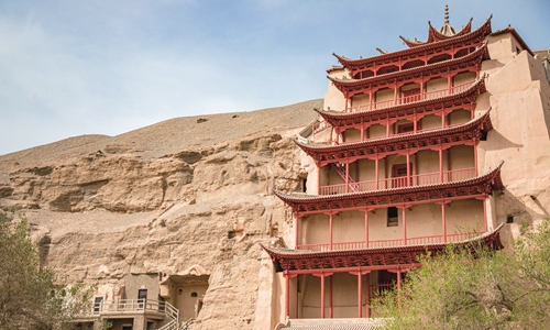 Dunhuang Academy engineers honored for outstanding dedication to preservation of history