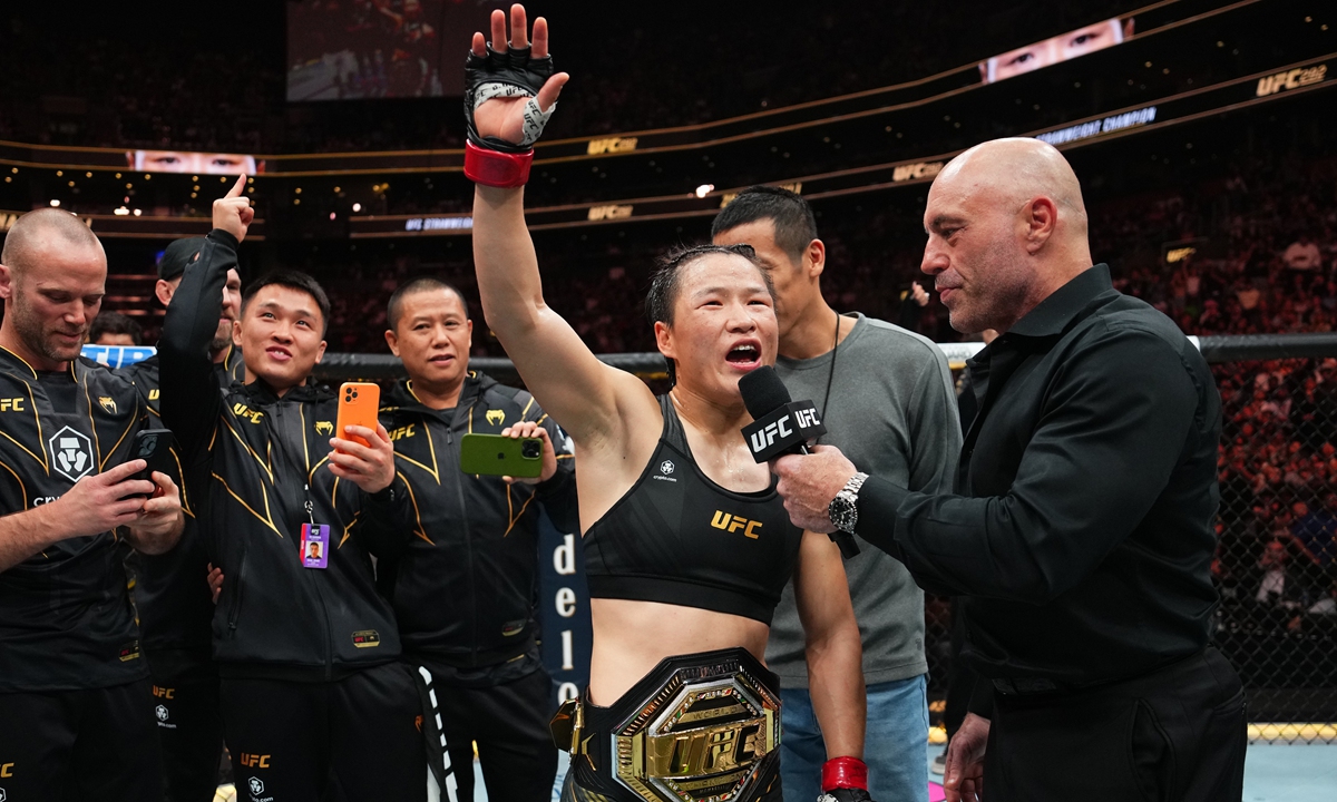 Zhang Weili defends UFC world champion title against compatriot Yan