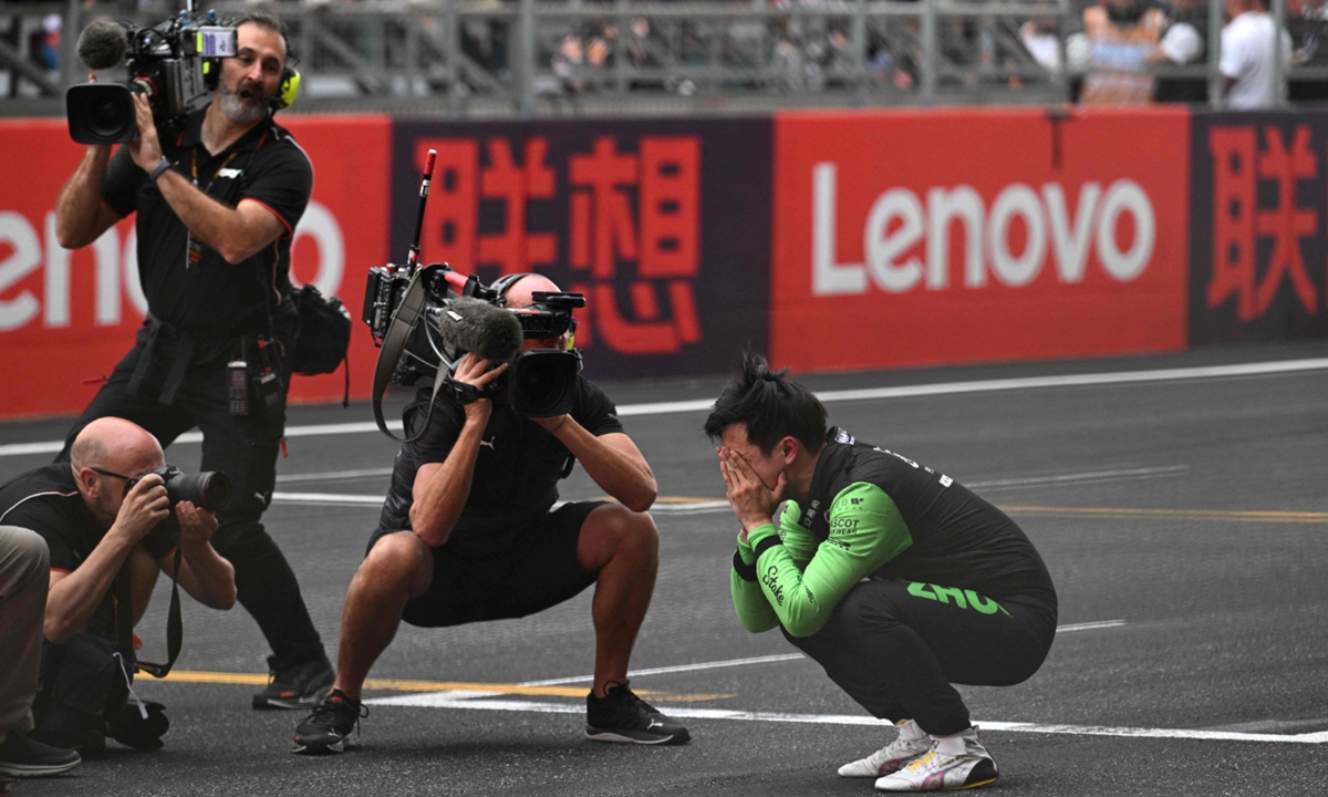Emotional Zhou makes F1 home debut