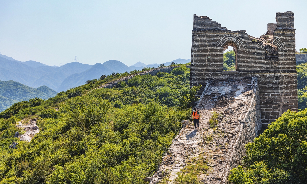 Villagers living at the foot of Great Wall protect it ‘as if guarding our home’