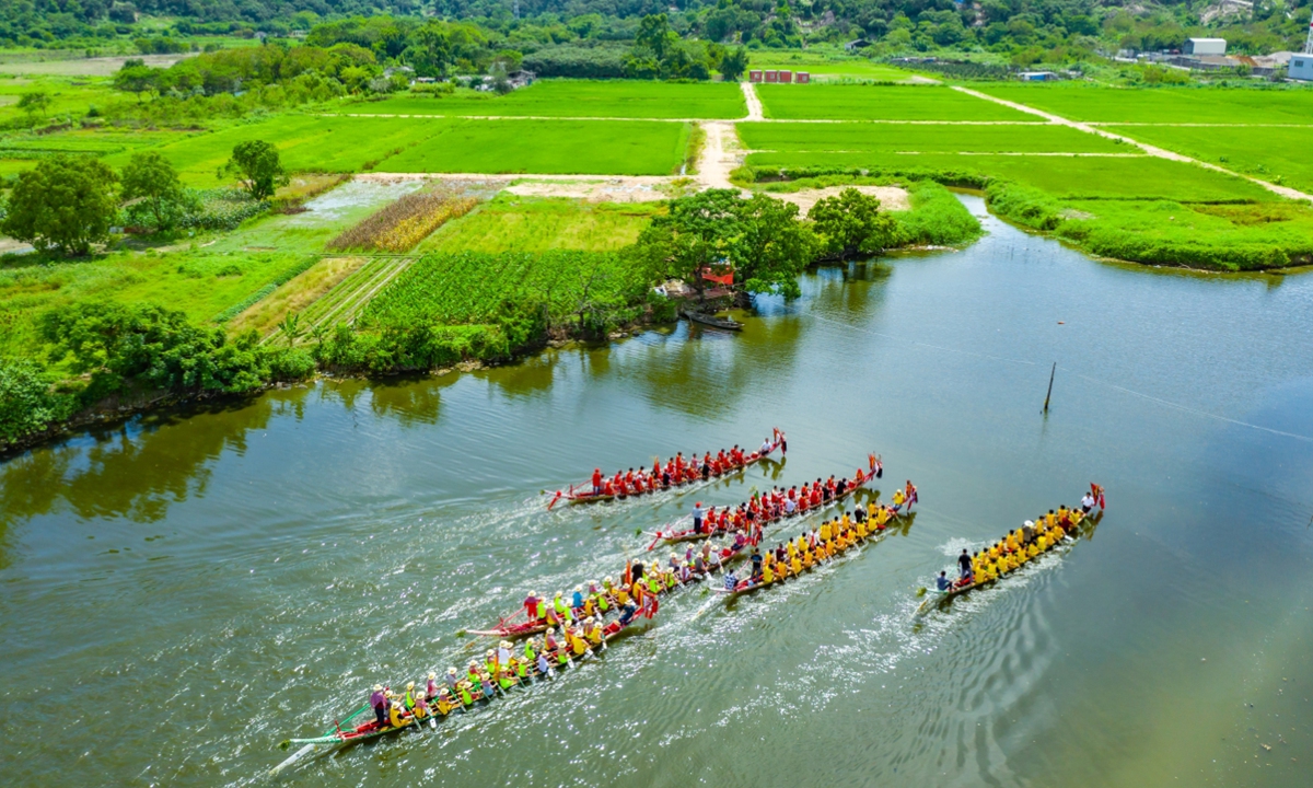 Duanwu Festival a time to retain health with rice dumplings and dragon boat race fun