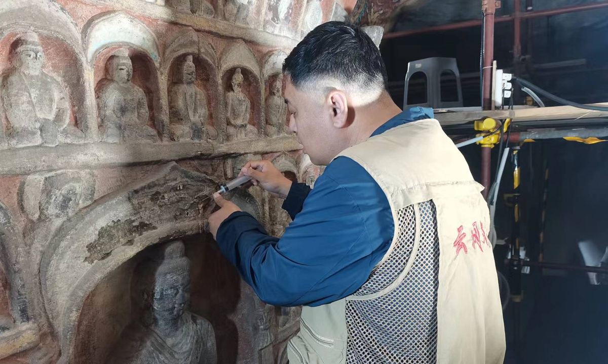 'Doctor of cultural relics' calls for more lost artifacts to return to Yungang