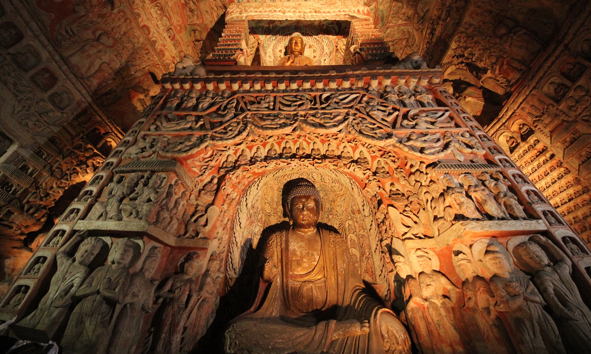 'Doctor of cultural relics' calls for more lost artifacts to return to Yungang
